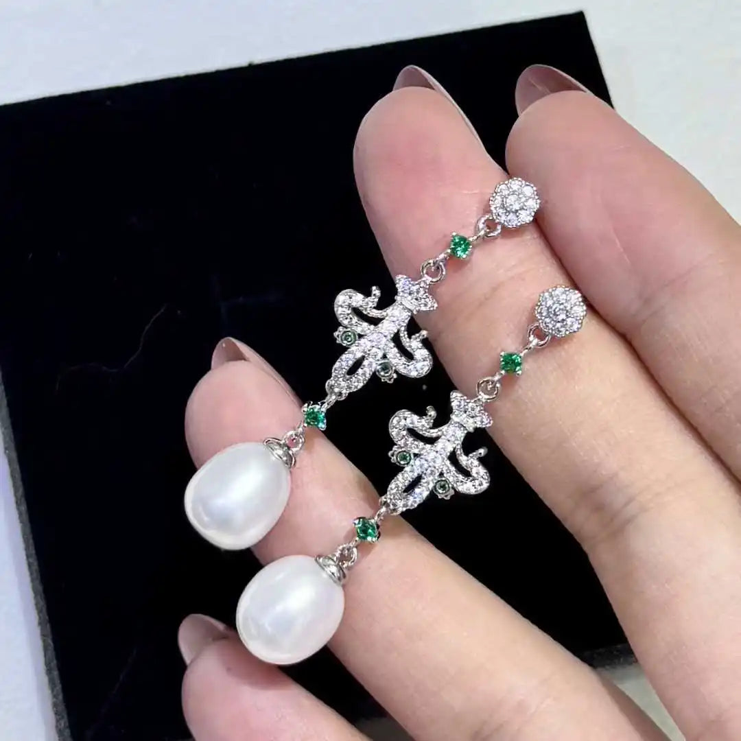 Silver Needle Anti-Allergy Design White Freshwater AAAA Grade Platinum Plated Rice Shape Water Droplet Pearl Earrings for Women