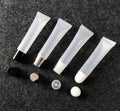 Wholesale 10ml PET Squeeze Plastic Lip Gloss Lipstick Cosmetic Packaging Tube with Hot Stamping Screw Cap