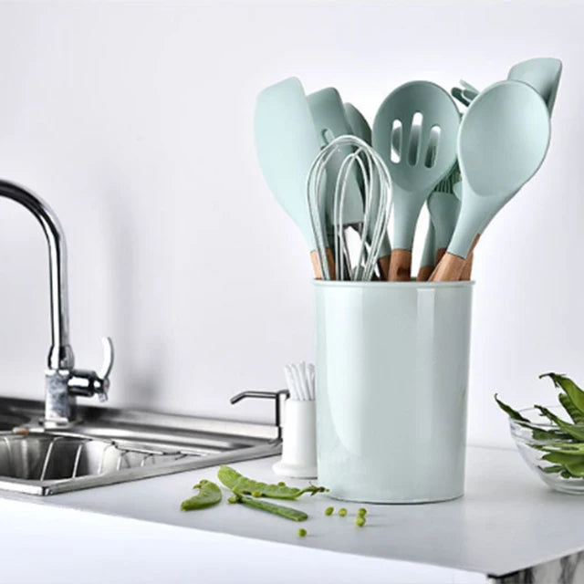 Wholesale and Custom 12PCS the New Green Silicone Kitchen Utensils Set BPA Free Non-Toxic Cooking Tool With Wooden Handle