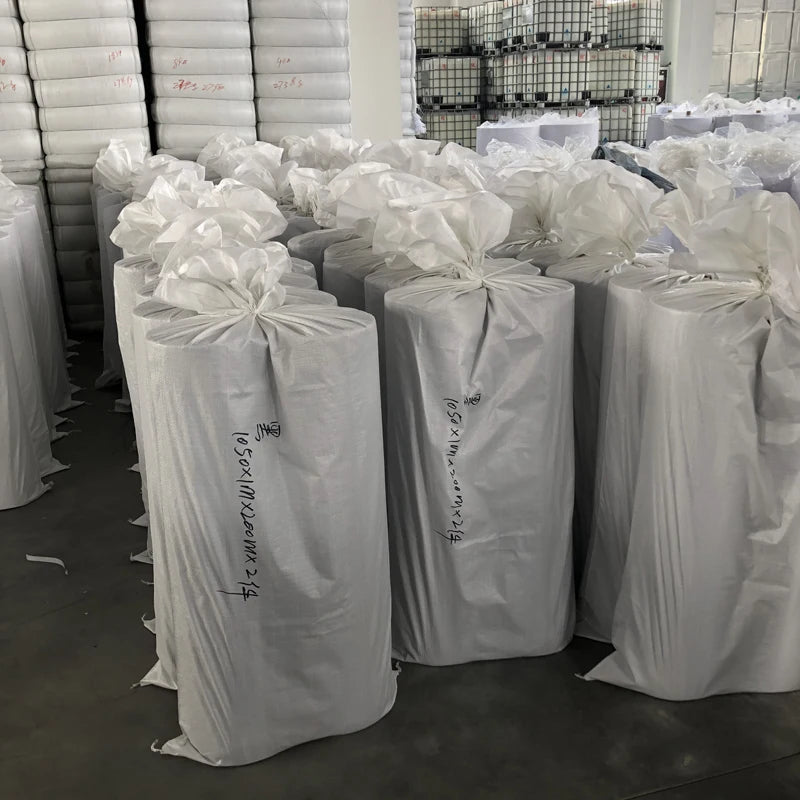 Wholesale 100% Polyester Fusible Nonwoven Interlining 63gsm Fabric Nonwoven Sms Fabric YB GL-1063H 63G HARD