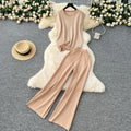 Bohemian Summer Seaside Vacation Two-Piece Set: Knitted Halterneck Top with Tassels & High-Waisted Hollow-Out Long Trousers