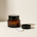 Wholesale 20g 30g 50g 100g Black Glass Jars for Cosmetics Face Cream Packaging with ABS Lid and Balms Containers