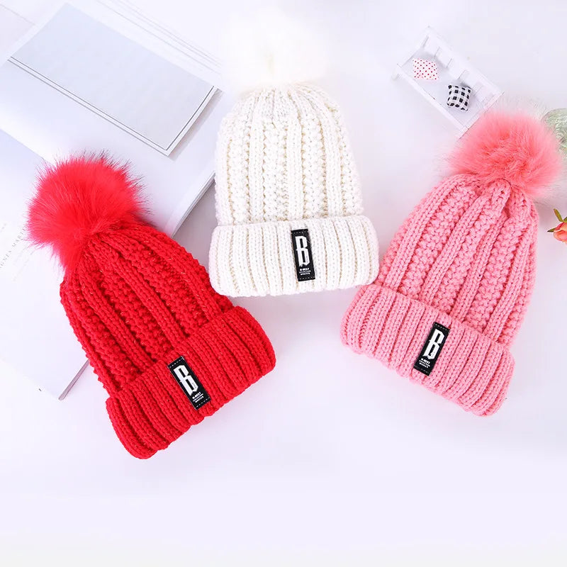 Women's Custom Logo Jacquard Common Polyester/Cotton Cable Knitting Fur Pom Pom Winter Chunky Crochet Character Beanie Adults