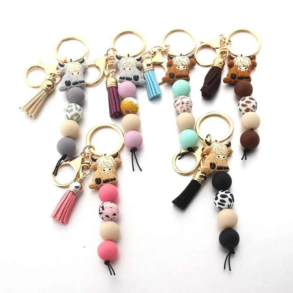 Hot Selling DIY Accessories Creative Bull Pendant Keychain with Silicone Beaded Bracelet and Rechargeable Doll Pattern