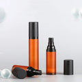 Wholesale Facial Cream Cosmetic Packaging 15ml 30ml 50ml Matte Orange Airless Pump Spray Lotion Bottle