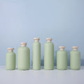 2022 New Arrival Light Green Plastic Empty Shampoo Bottles 200/260/300/400/500ml Pump Cover Screen Printing Cap Brush Sealant