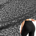 Low Moq Colored Leopard Printed Embossing Pants Fabric with Moisture Wicking Function