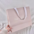 Luxury Beige Shopping Bags With Ribbon Handle Boutique Customized Printed Euro Paper Gift Bags With Logo