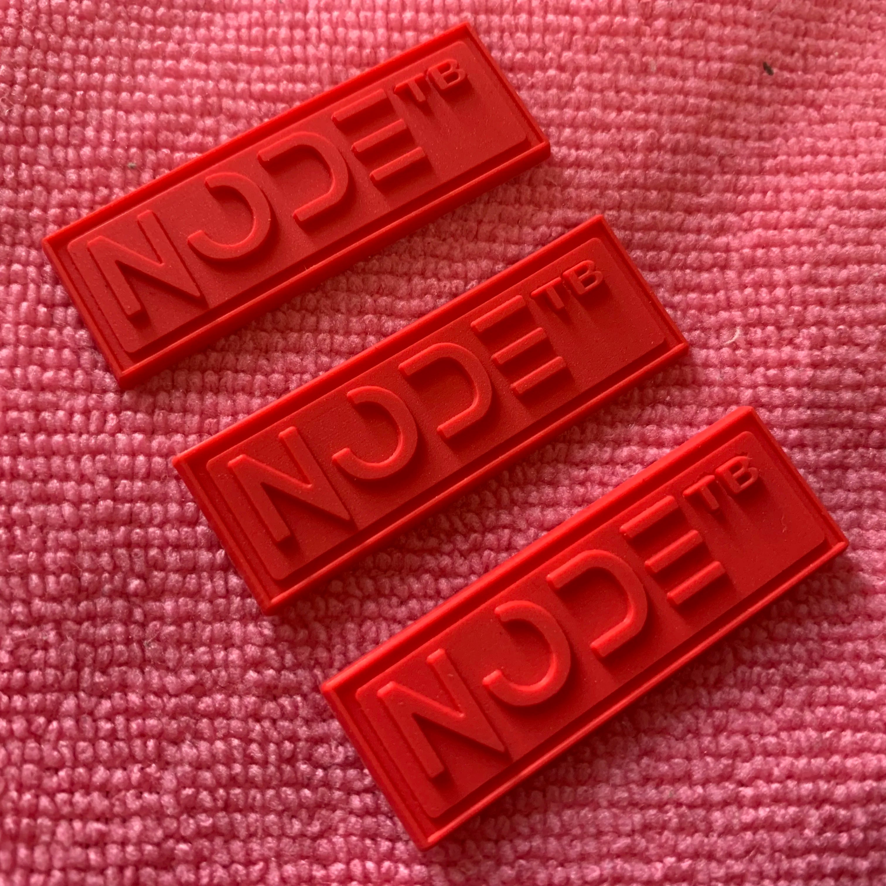 Single Red Color Embossed Silicone Rubber Label for Garmentfancy Design 3D logo PVC Name Label for Shoes