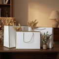 Recyclable Boutique Retail Carry Bags for Garments Custom Logo Art Paper Fashion Handle Luxury Retail Clothing Packaging Bags