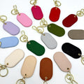 Gifts Saffiano Leather Keyring Personalized PU Oval Shape Vegan Leather Keychain Heavy Duty Metal Gold Hardware Custom Key Chain