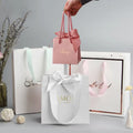 Manufacturer Custom Logo Art Paper Bags Lamination Ribbon Jewelry Cosmetics Luxury Packaging Bag Gift Bags