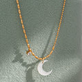 Dreamshow Asymmetrical Bead Chain Gold Plated Pendant Necklace Rice Bead White Shell Moon Crescent Stainless Steel Necklace