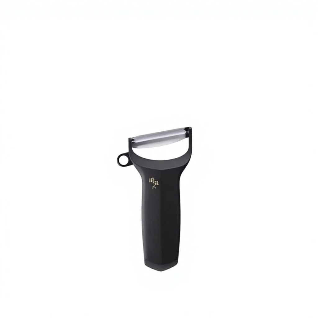 Kai Sekimagoroku Compact Manual Stainless Steel Peeler with Sharp Blade DH3341 Made in Japan Black