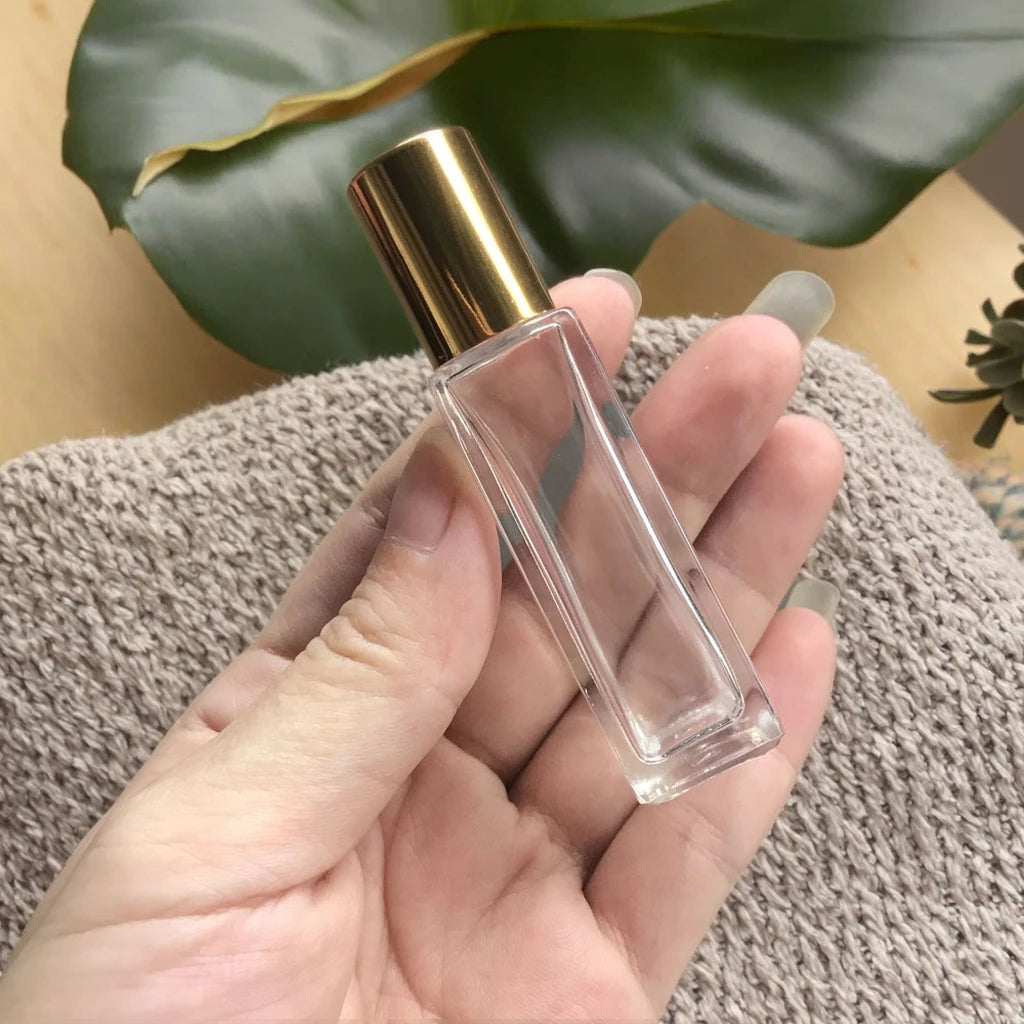 Wholesale 9ml 10ml Rectangle Cuboid Roller Glass Bottle with Gold Cap for Essential Oil Roll on Sealing