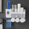 Wholesale Eco-Friendly White ABS Plastic Wall Mount Four-Piece Toothpaste Dispenser Holder Set with Custom Logo for Bathroom Use