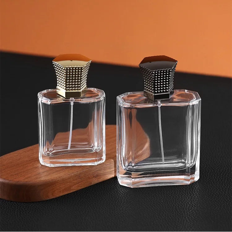 New Design   100ml  Flat  Glass Bottle Crimp Pressurized Atomizer Glass Perfume Bottle with Luxury Alloy  Cap