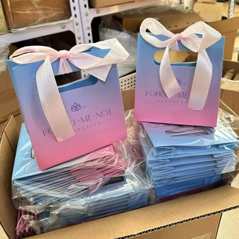 New Luxury Custom Your Own logo Shopping Paper Bag for Clothes pink Matte Clothing Boutique Packaging Bags with Ribbon Handles