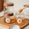Kitchen Hand Blown Small Round Sealed Tea Food Containers High Borosilicate Glass Storage Jars Honey Bottles With Wooden Lids