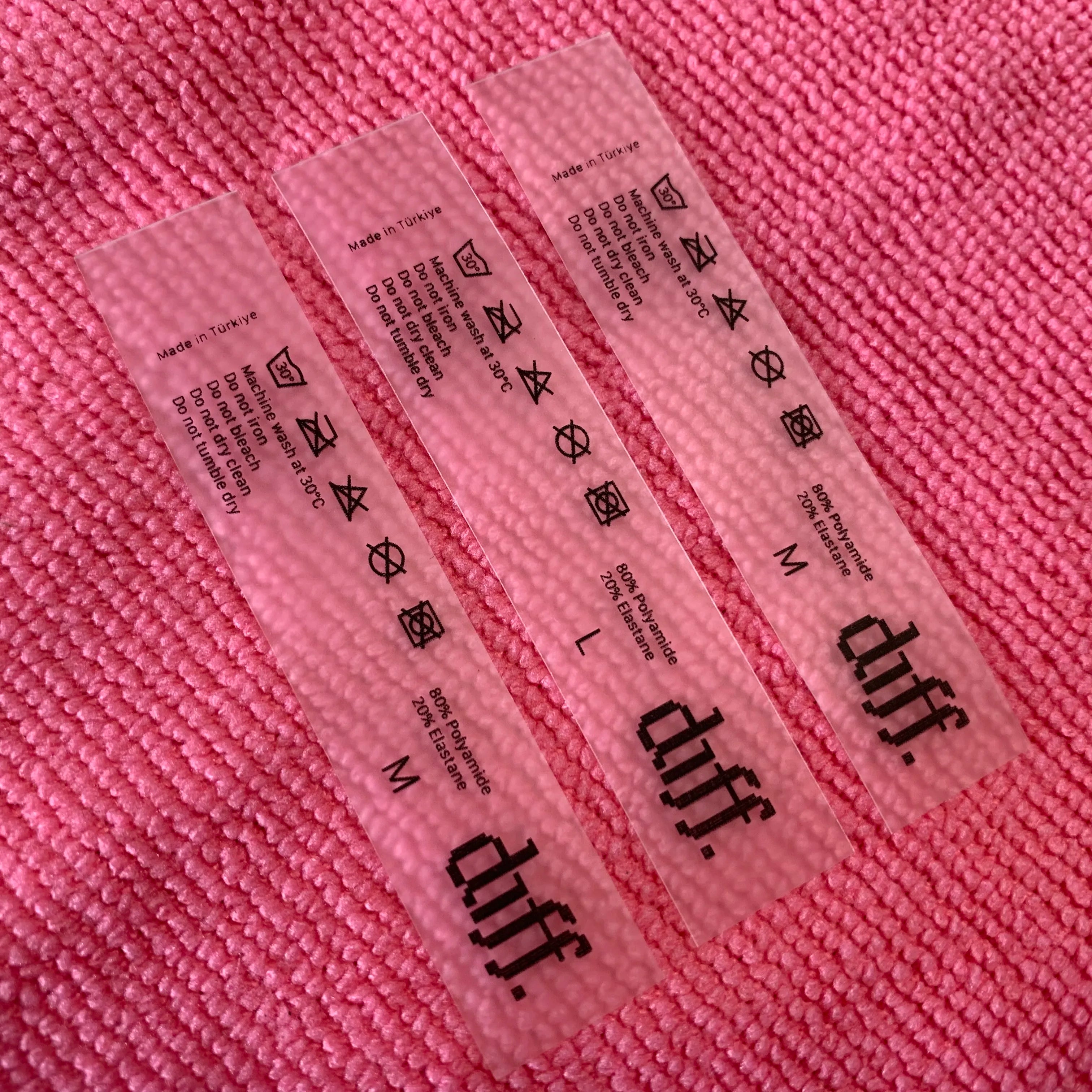 Stitching on clear Washing Size TPU Swimsuits Labelsoft Transparent Printing TPU Plastic Tag for Swimwear