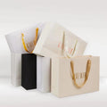 Fashion Luxury Custom logo Colorful Kraft Paper Shopping Bag Gift Bag for Clothing Packaging/jewelry With Handles