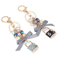 HOT Perfume Bottle Number 5 Diamond Keychain Bow Pearl Beads Handbag Personalized Keyring for Women Wallet Girls Car Key Rings