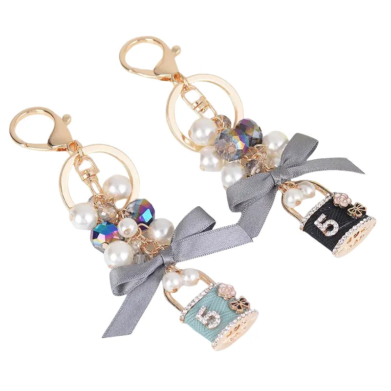 HOT Perfume Bottle Number 5 Diamond Keychain Bow Pearl Beads Handbag Personalized Keyring for Women Wallet Girls Car Key Rings