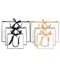 Factory Wholesale Reusable Paper Bags Custom Luxury Clothes Shoes Cosmetics Wig Paper Gift Bags With Handle and Bowknot
