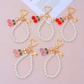 Cute Water Diamond Bow Cherry Gemstone Keychain Pendant Creative Pearl Zinc Alloy Personalized Fashion Car Bag Key