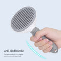 Sustainable Self-Cleaning Slicker Effect Pet Spray Comb Dog and Cat Grooming Tool with Massage Feature for Pet Care