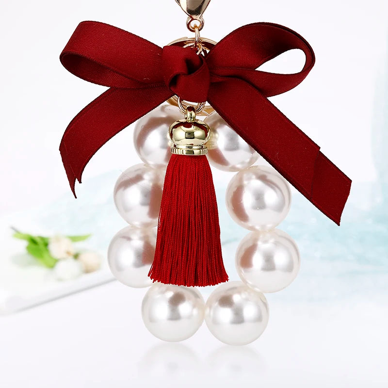 Wholesale Women Big Pearl Bow Tie Bag Key Ring Gift Fabric Bow Knot Tassel Pearl Keychain for Bag
