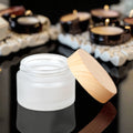 Fuyun 5-100g Frosted Amber Glass Face Cream Jar with Clear Black Plastic Lids Empty Wood Black Gold Screw Lotion Storage Jar