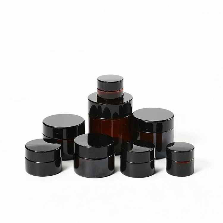 Wholesale Luxury Custom Black Frosted Amber 2oz 30ml 50ml 100ml Face Cream Cosmetic Glass Jars With Lids