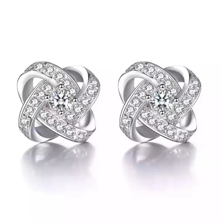 SC Korean Piercing Jewelry Temperament Cubic Zirconia Rotating Four Leaf Earrings Trend Diamond Stud Earrings for Women
