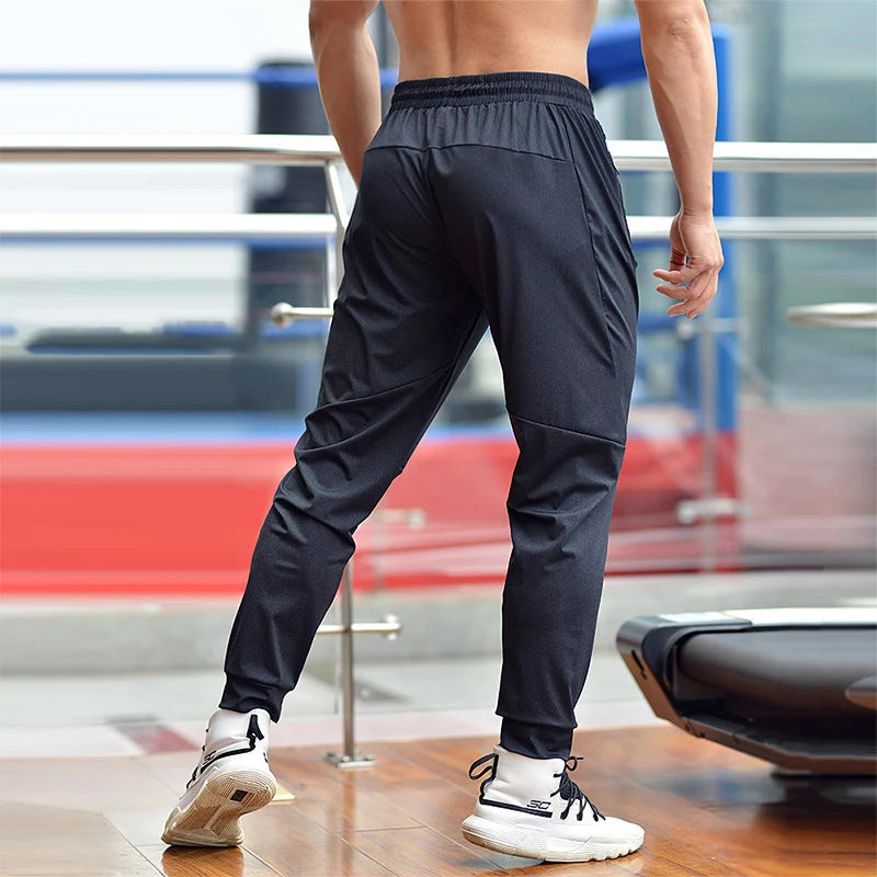 Custom logo Skinny Sweatpants Men Big Elastic Cool Dry Breathable  Nylon Jogger Tracking Bottom Pants