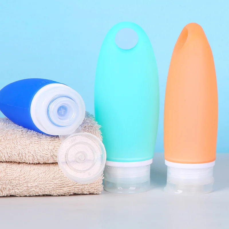 Wholesale Foldable Squeeze Cosmetic Silicone Lotion Shampoo Bottle Sport Gym Sanitizer Travel Bottle Kits With Hole