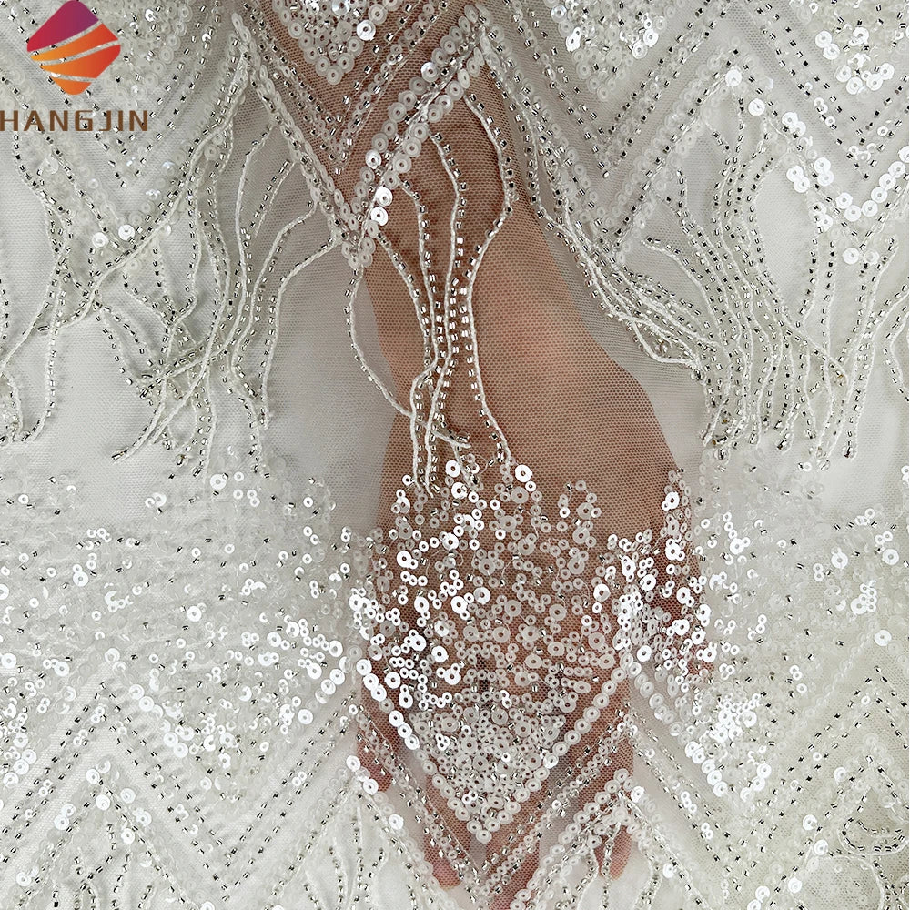 High Quality White Heavy Beaded Embroidered Lace Fabric With Sequins Tassel Design Luxury Tulle Mesh Lace Fabric for Wedding MegaBDM