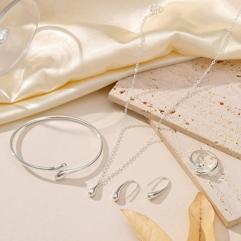 2025 Women's Fashion Jewelry 4pcs Set Water Drop Pendant Necklace Earrings Bracelet Ring Set Valentine's Day Gift Jewelry