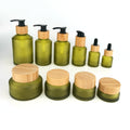 Inclined Shoulder Olive Green Glass Bottle 30 ml 60 ml 100 ml 200 ml Cosmetic Bottle and 30 gm  50 gm Glass Jar With Bamboo Lid