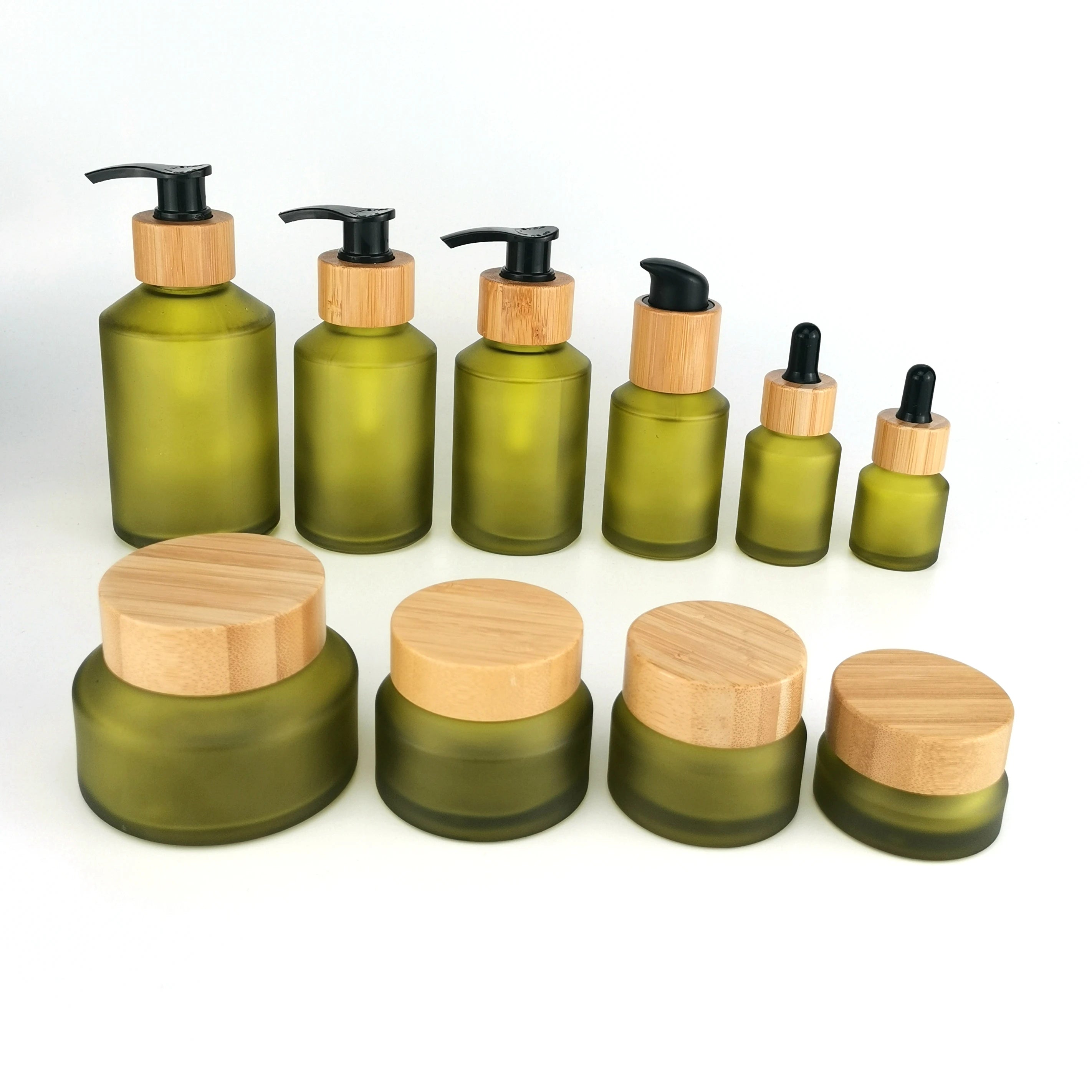 Inclined Shoulder Olive Green Glass Bottle 30 ml 60 ml 100 ml 200 ml Cosmetic Bottle and 30 gm  50 gm Glass Jar With Bamboo Lid