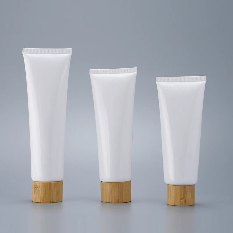 Empty Cosmetic Packaging 15g 30g 50g 60g 100g 150g 200g 250g Soft White PE Plastic Facial Cleanser Cream Tube with Bamboo Cover