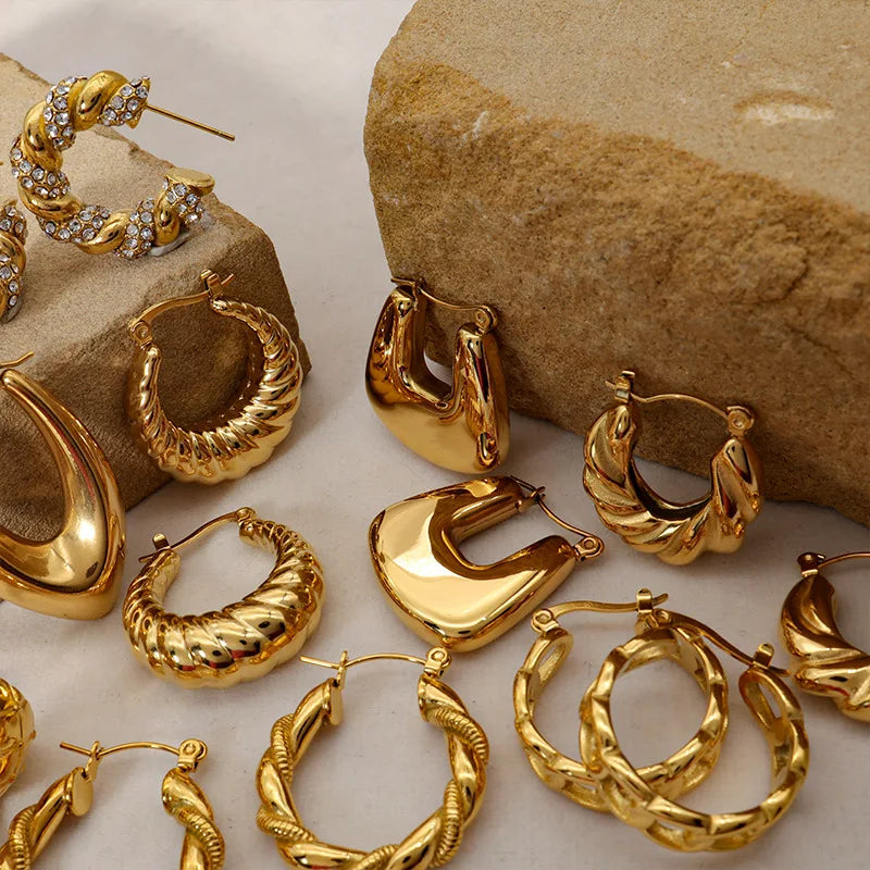Fashion Retro Geometric Stainless Steel Golden Pattern Horns C-shaped Hoop Earrings Wholesale