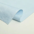 Factory wholesale 100% polyester peach skin microfiber satin fabric for beach shorts