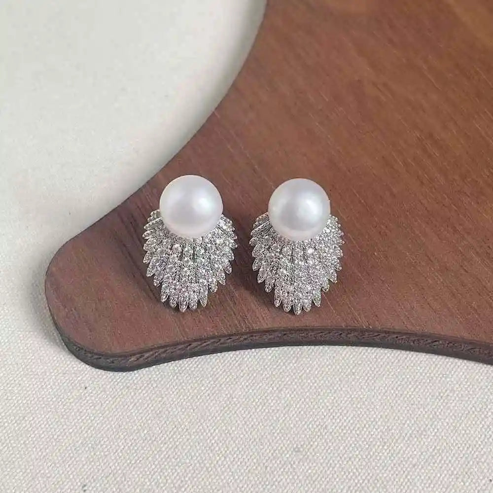 Trendy Silver Plated Stud Earrings with Hypoallergenic Design Natural 7-8mm Freshwater Pearl & Feather Shape-Gift for Women