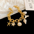 Chic Women's Gold Plated Alloy Charm Bracelet with Starfish Pearl and Sea Shell Design Trendy Party Jewelry for Daily Use
