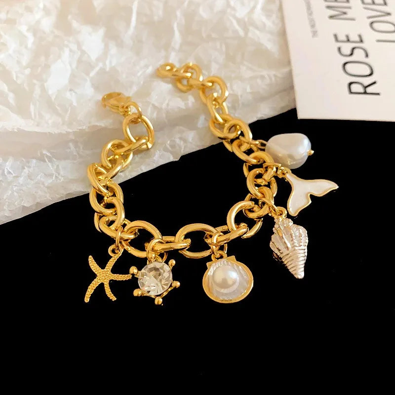 Chic Women's Gold Plated Alloy Charm Bracelet with Starfish Pearl and Sea Shell Design Trendy Party Jewelry for Daily Use