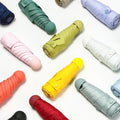 Factory Hot Selling Retail Price UV Sun and Rain Five Folding Capsule Fashion Mini Pocket Umbrella