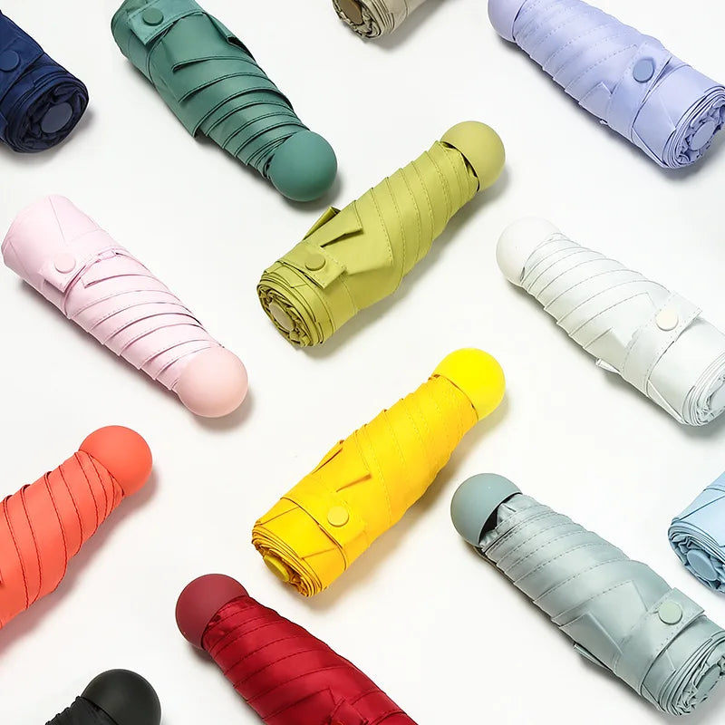 Factory Hot Selling Retail Price UV Sun and Rain Five Folding Capsule Fashion Mini Pocket Umbrella