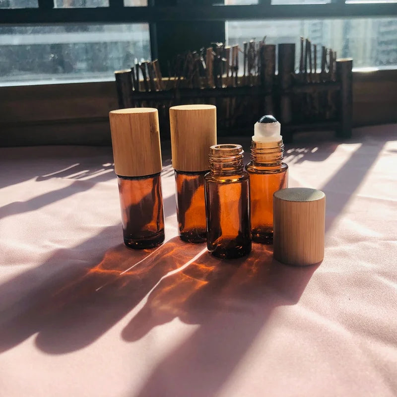 Wholesale 5ml Dark Brown Amber or Amber Frost Roller Glass Bottle UV Protect Thick Wall with Real Bamboo Roll on Cap