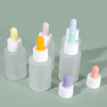 New Design Colorful Rubber Head Frosted Matte Essential Oil Essence Dropper Bottle 30ml Cosmetic Glass Serum Bottle